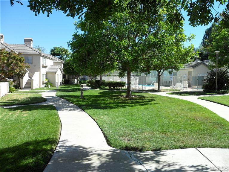 1031 Waltham Road, Unit E Simi Valley, CA 93065 - Photo 10 of 10 a view of a park with plants and trees