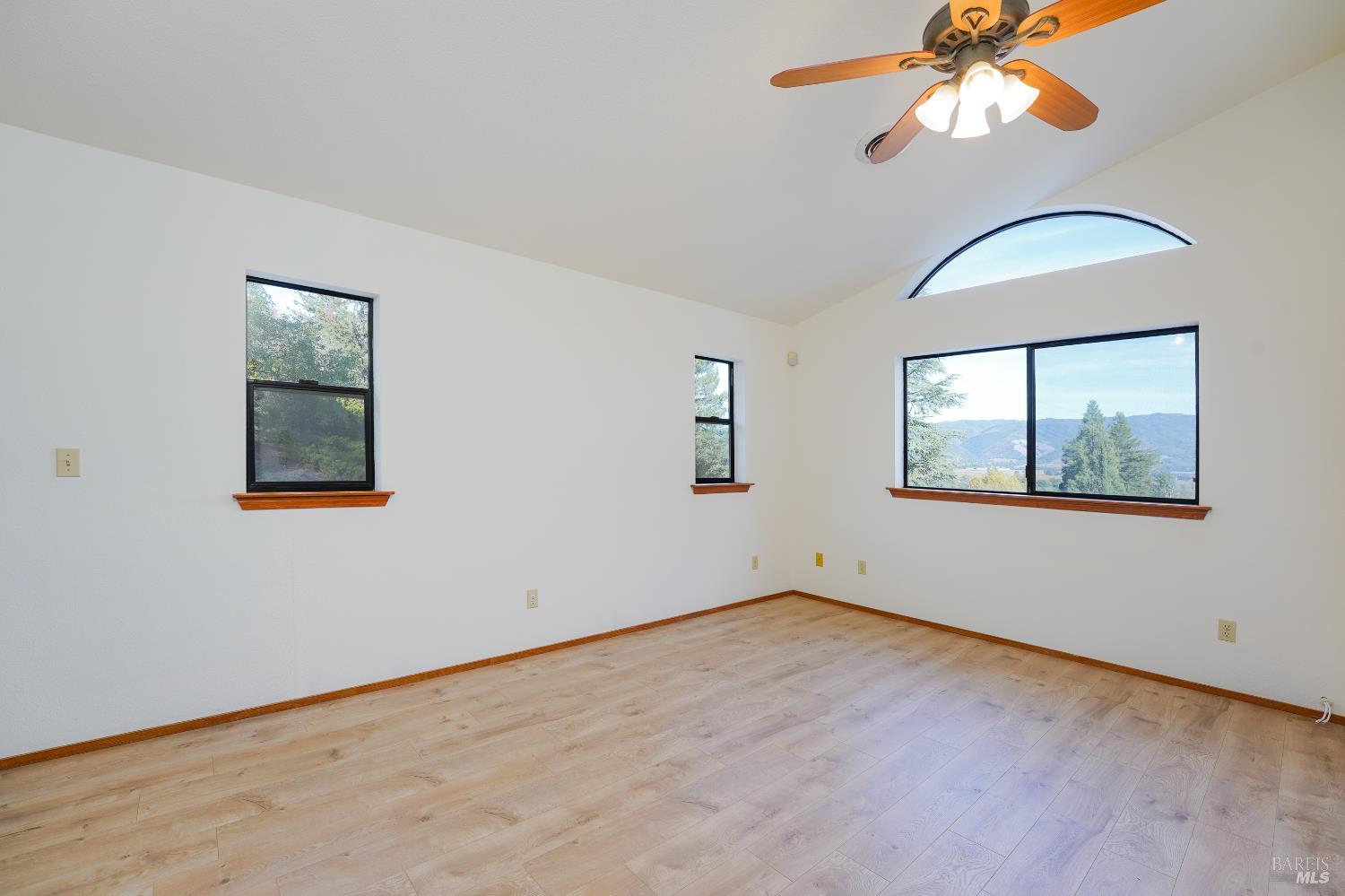 301 Toyon Road Ukiah, CA 95482 - Photo 18 of 46 Primary bedroom filled with natural light and beautiful views