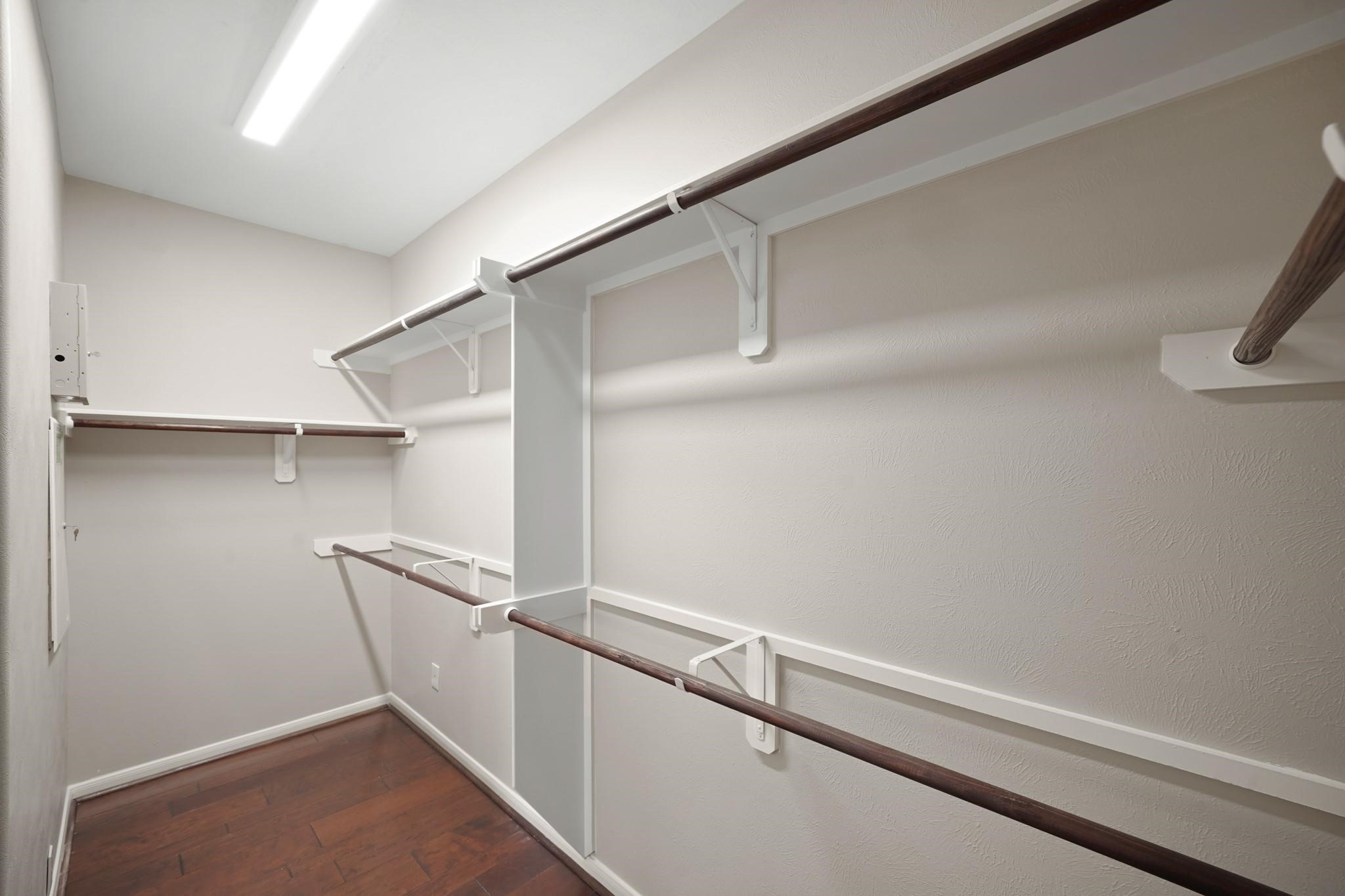714 Coggins Point Way Sugar Land, TX 77479 - Photo 19 of 32 a view of an empty walk in closet