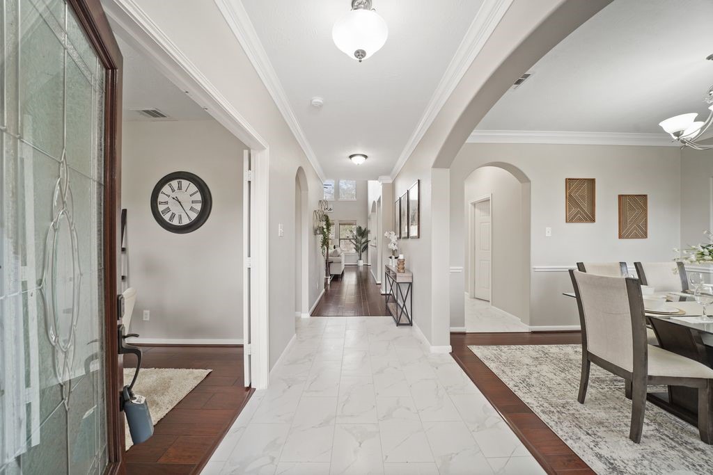 714 Coggins Point Way Sugar Land, TX 77479 - Photo 5 of 32 a view of a hallway with seating area