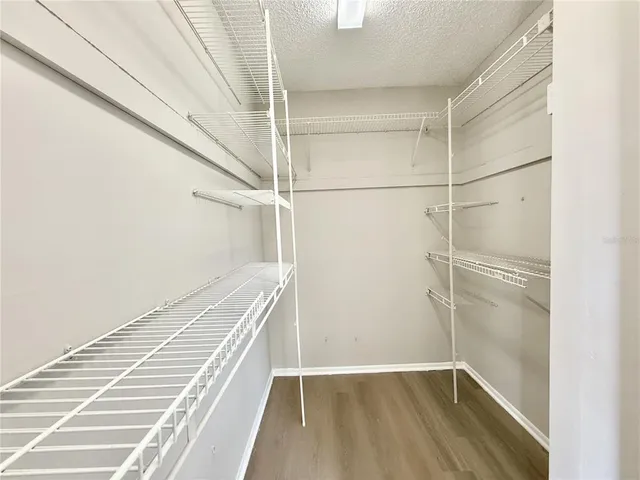 a view of an empty walk in closet