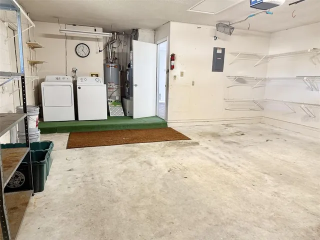 a view of a utility room with closet