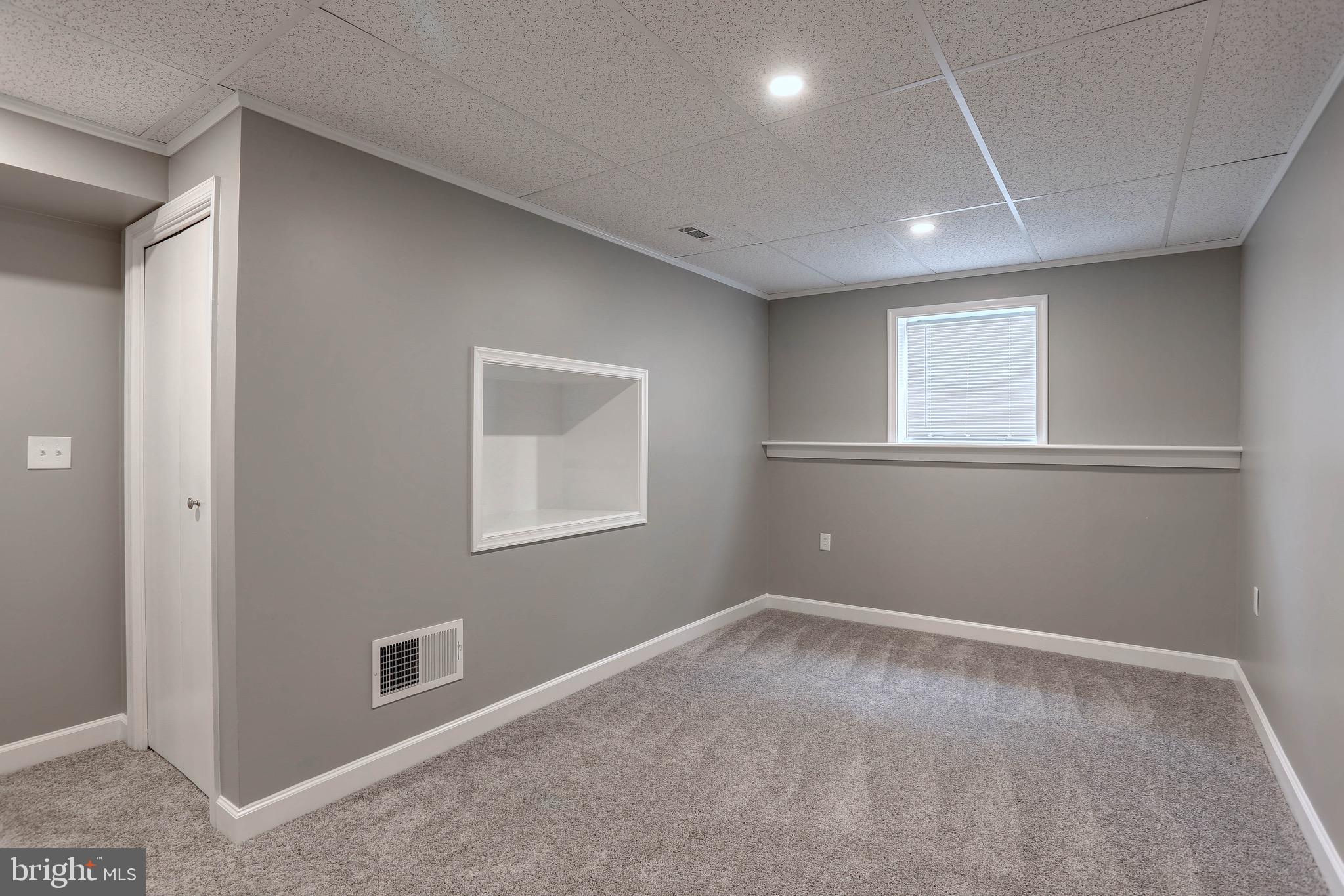 459 A Community Road Severna Park, MD 21146 - Photo 27 of 37 Lower level bedroom with cedar closet