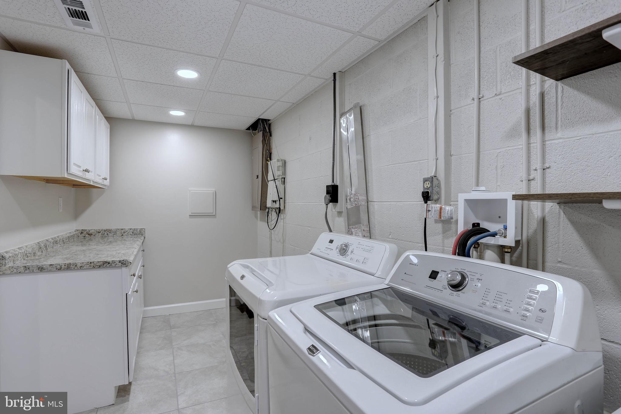 459 A Community Road Severna Park, MD 21146 - Photo 31 of 37 Laundry area w/ plenty of storage and folding area