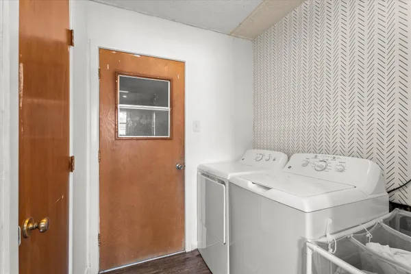 a utility room with dryer and washer