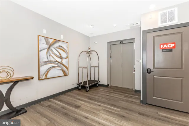 a view of a patio with a dining table and chairs