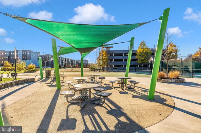 a city street lined with buildings and cars