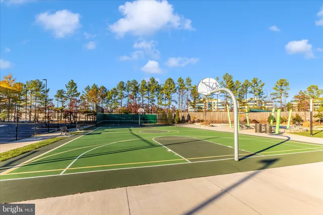 a city street lined with buildings and cars