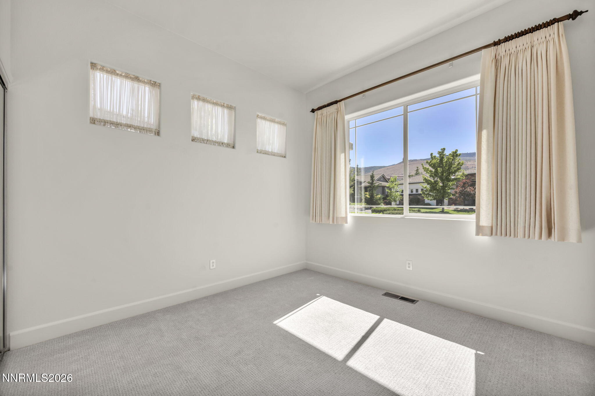 574 Echo Ridge Court Reno, NV 89511 - Photo 44 of 58 a view of an empty room with a window