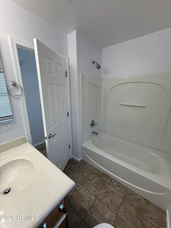 a bathroom with a sink and a vanity