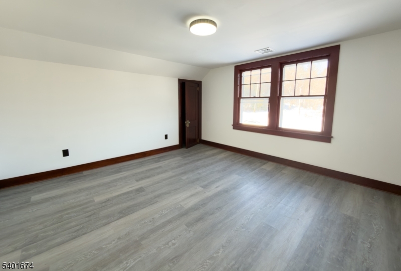 24 Hope Road Great Meadows, NJ 07838 - Photo 16 of 26 an empty room with wooden floor and windows