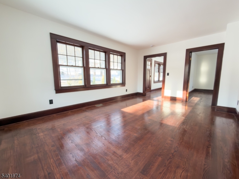 24 Hope Road Great Meadows, NJ 07838 - Photo 3 of 26 a view of an empty room with wooden floor and a window