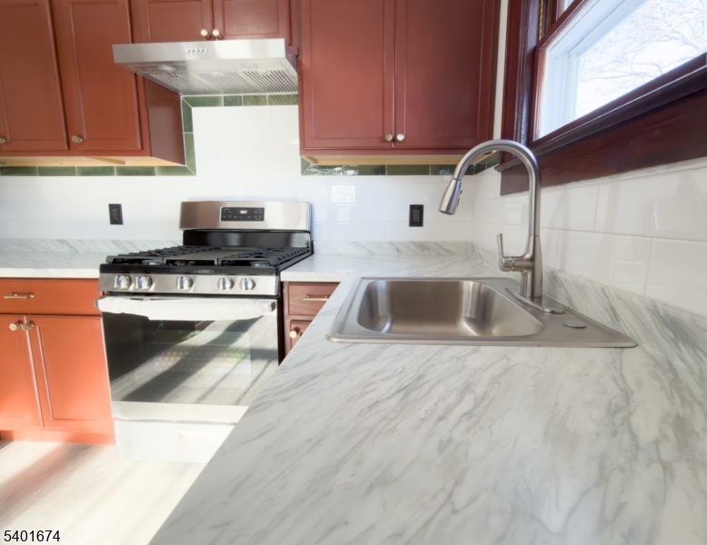 24 Hope Road Great Meadows, NJ 07838 - Photo 8 of 26 a kitchen with stainless steel appliances granite countertop a sink stove and cabinets