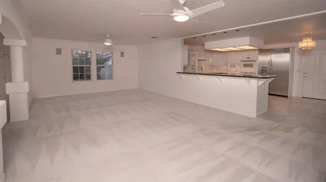 a view of a kitchen with a sink