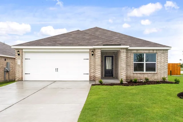 a front view of house with yard