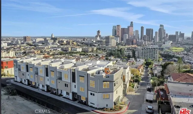 a view of a city with tall buildings