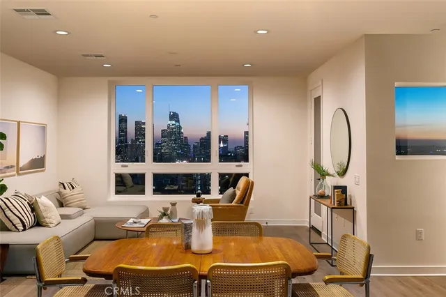 a bathroom with a sink a vanity and a window