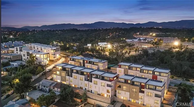 a view of a city with a lake view