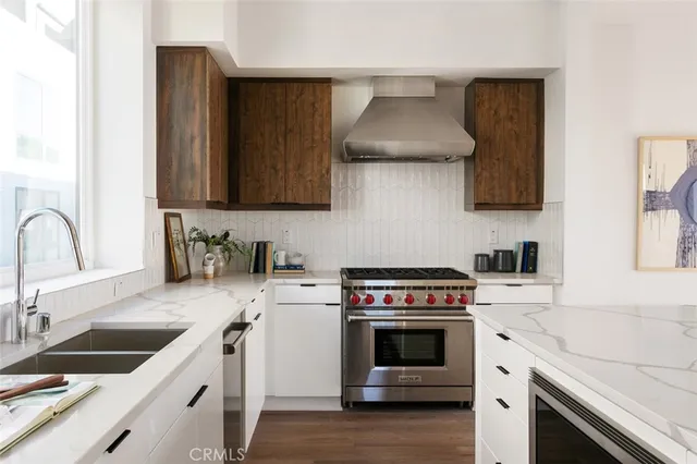 a bathroom with a tub sink and shower
