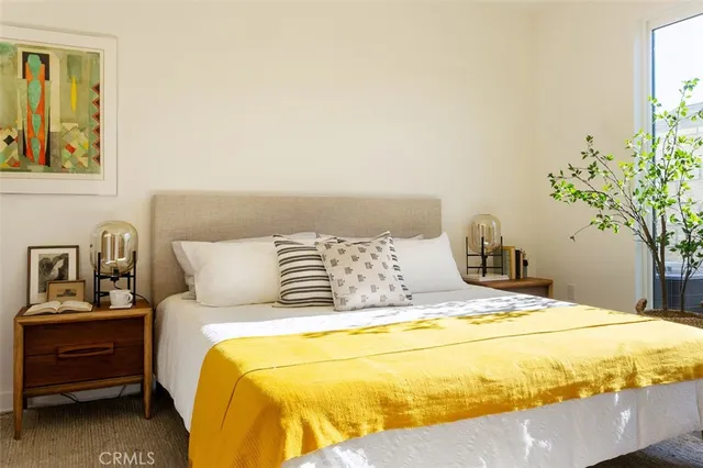 a view of a workspace with furniture and wooden floor