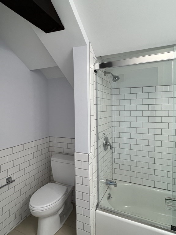 10 Deerfield Avenue, Unit 2 Shelburne, MA 01370 - Photo 15 of 26 a bathroom with a toilet and a bathtub
