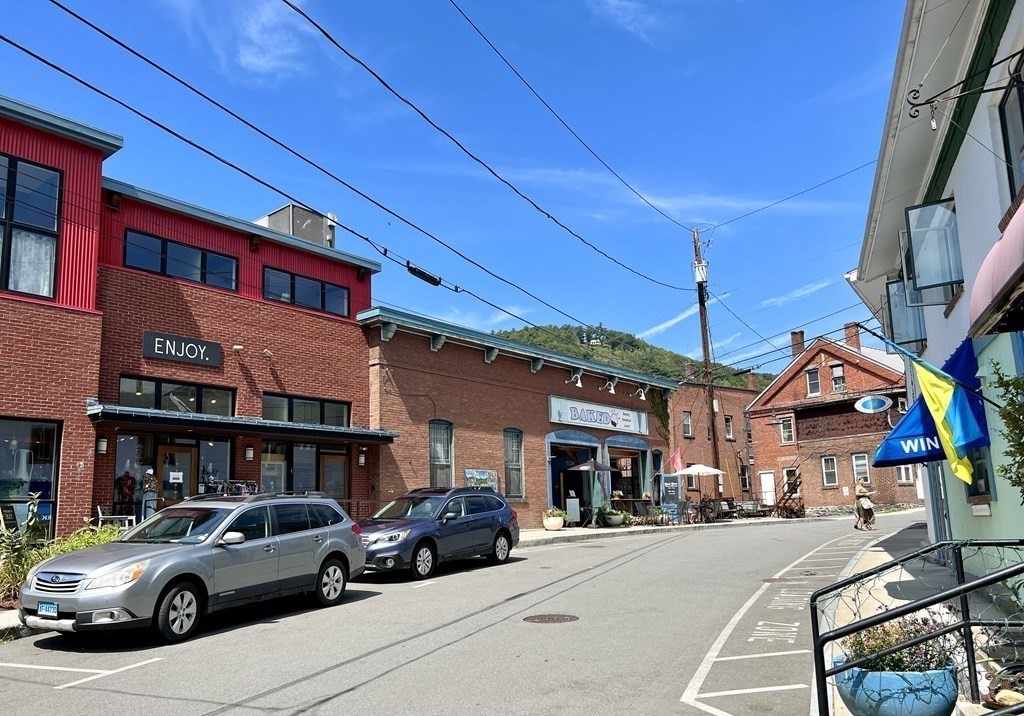 10 Deerfield Avenue, Unit 2 Shelburne, MA 01370 - Photo 21 of 26 a car parked in front of a building