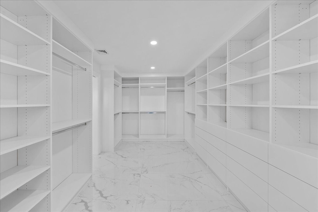 17 Harwood Road Natick, MA 01760 - Photo 17 of 20 a view of an empty walk in closet