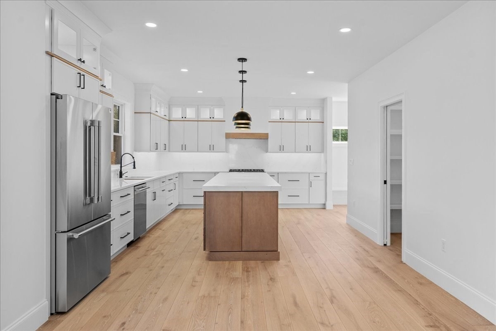 17 Harwood Road Natick, MA 01760 - Photo 10 of 20 a kitchen with stainless steel appliances a refrigerator sink and cabinets
