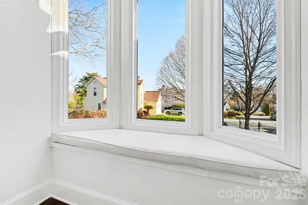 a view of a house with a tree