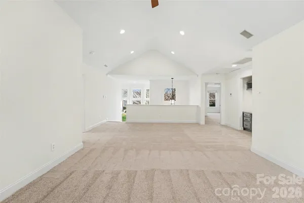 a view of a balcony with wooden floor