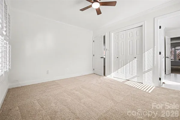 a view of a chairs and table in the balcony