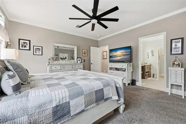 a en suite bathroom with a tub sink and window