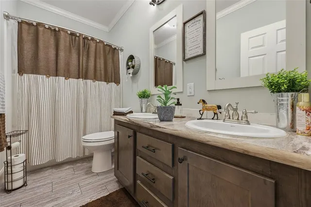 a view of a livingroom with workspace and a couch