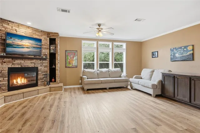 a view of a living room and workspace