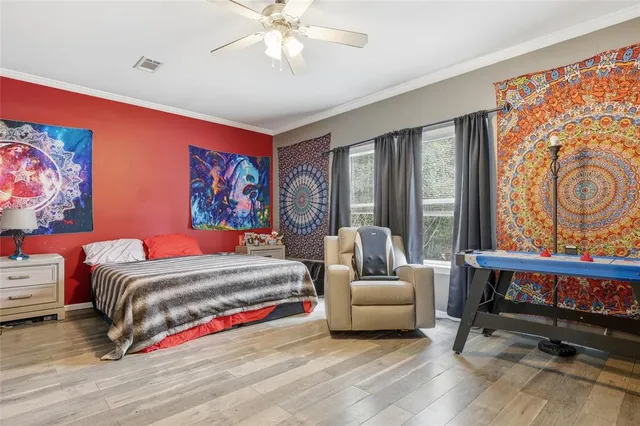 a bathroom with a granite countertop sink a mirror and a shower