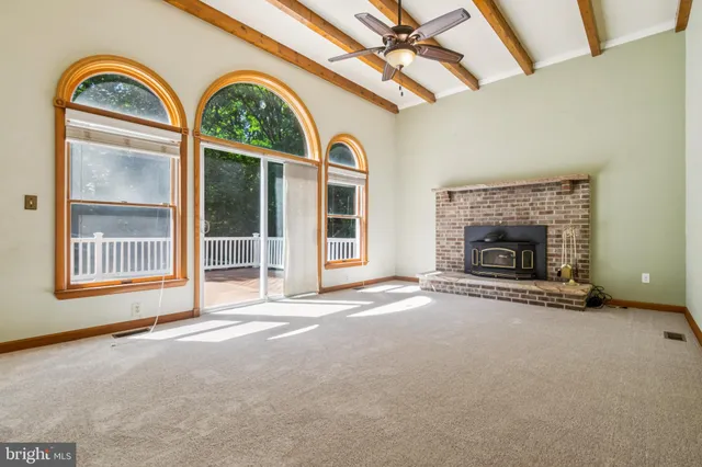 a view of an entryway with a floor to ceiling window