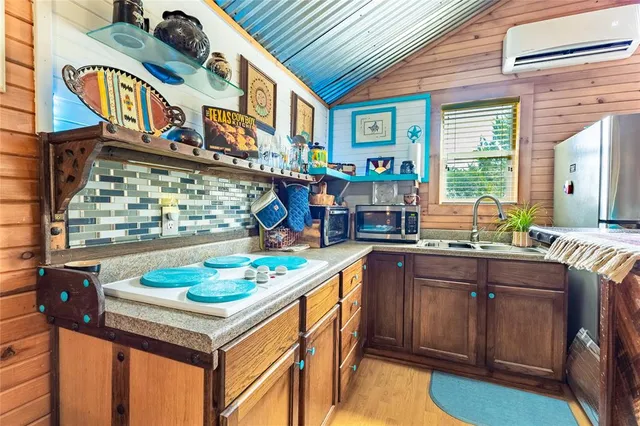 a table with chairs and a stove