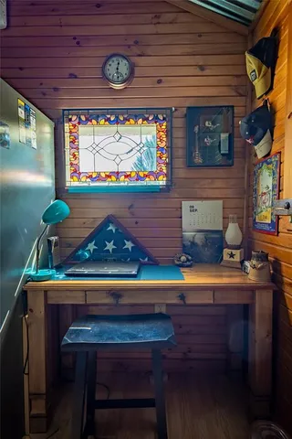 a very nice looking bedroom with a large window