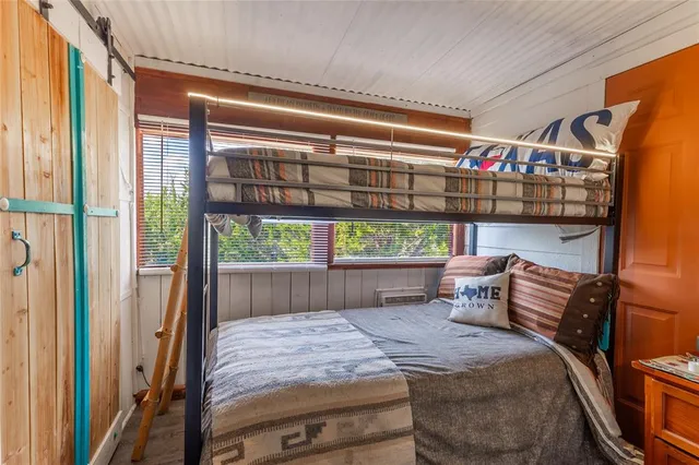 a view of living room with wooden floor