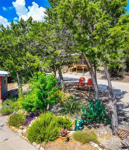 a backyard of a house with lots of green space