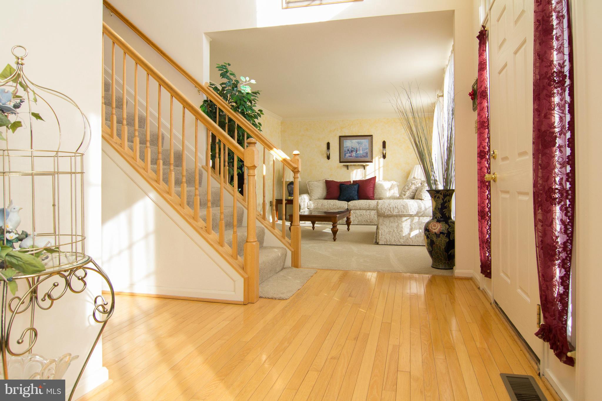 6312 Patuxent Quarter Road Hanover, MD 21076 - Photo 2 of 29 Foyer - Gleaming Wood Floors