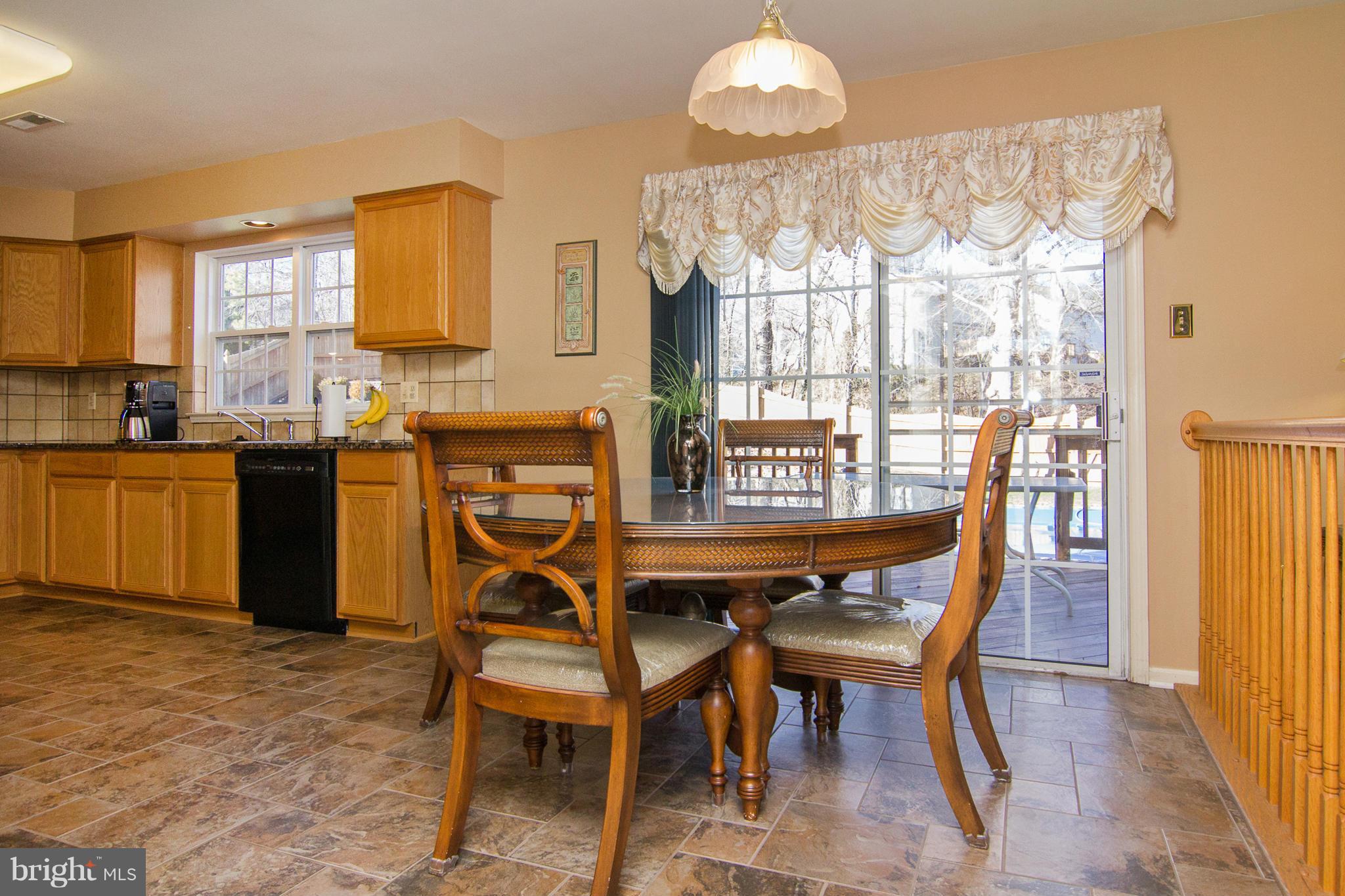 6312 Patuxent Quarter Road Hanover, MD 21076 - Photo 10 of 29 Kitchen - Slider Opens to Deck