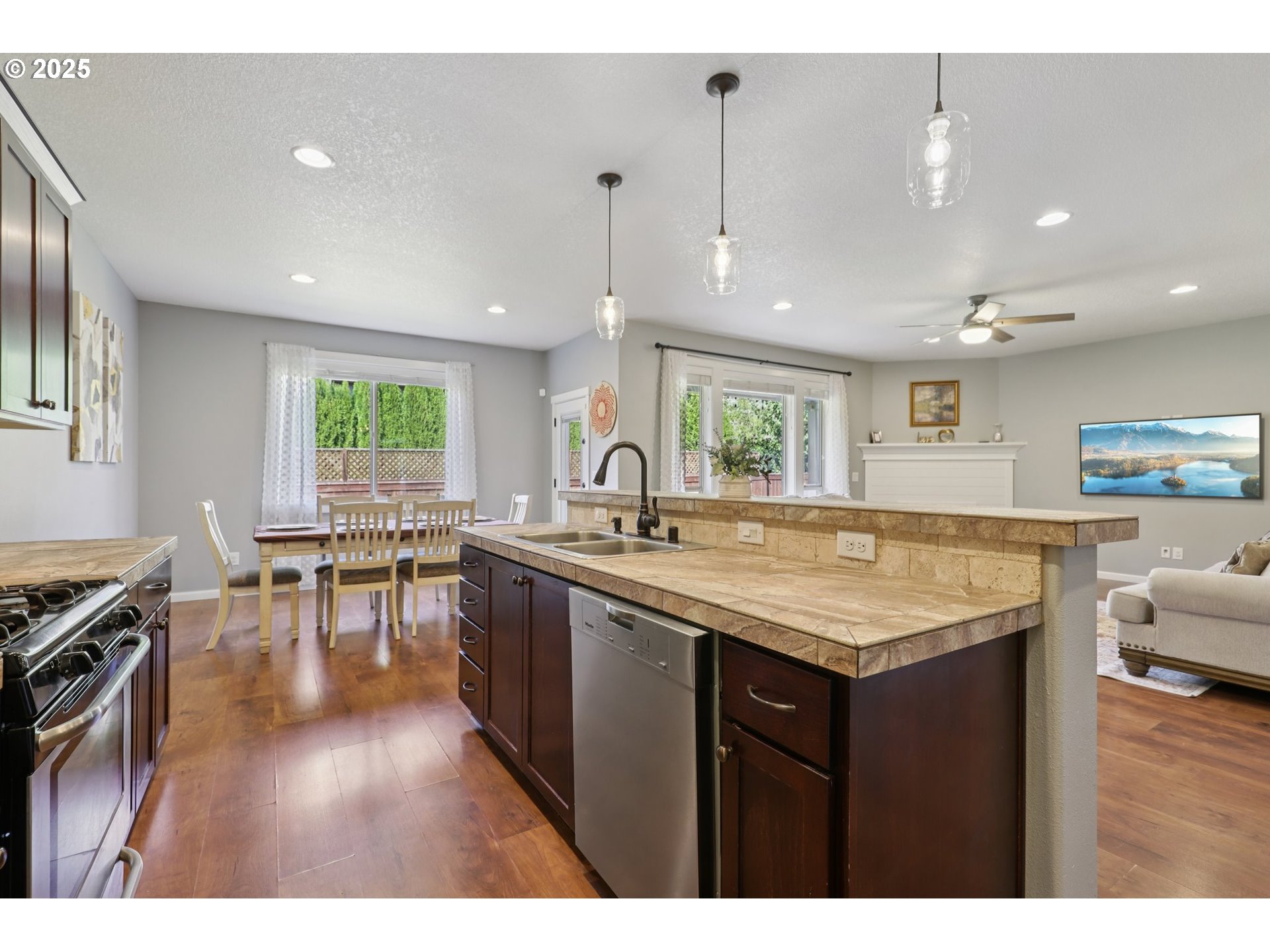3520 North 6th Circle Ridgefield, WA 98642 - Photo 14 of 27 a kitchen with lots of counter space and a sink