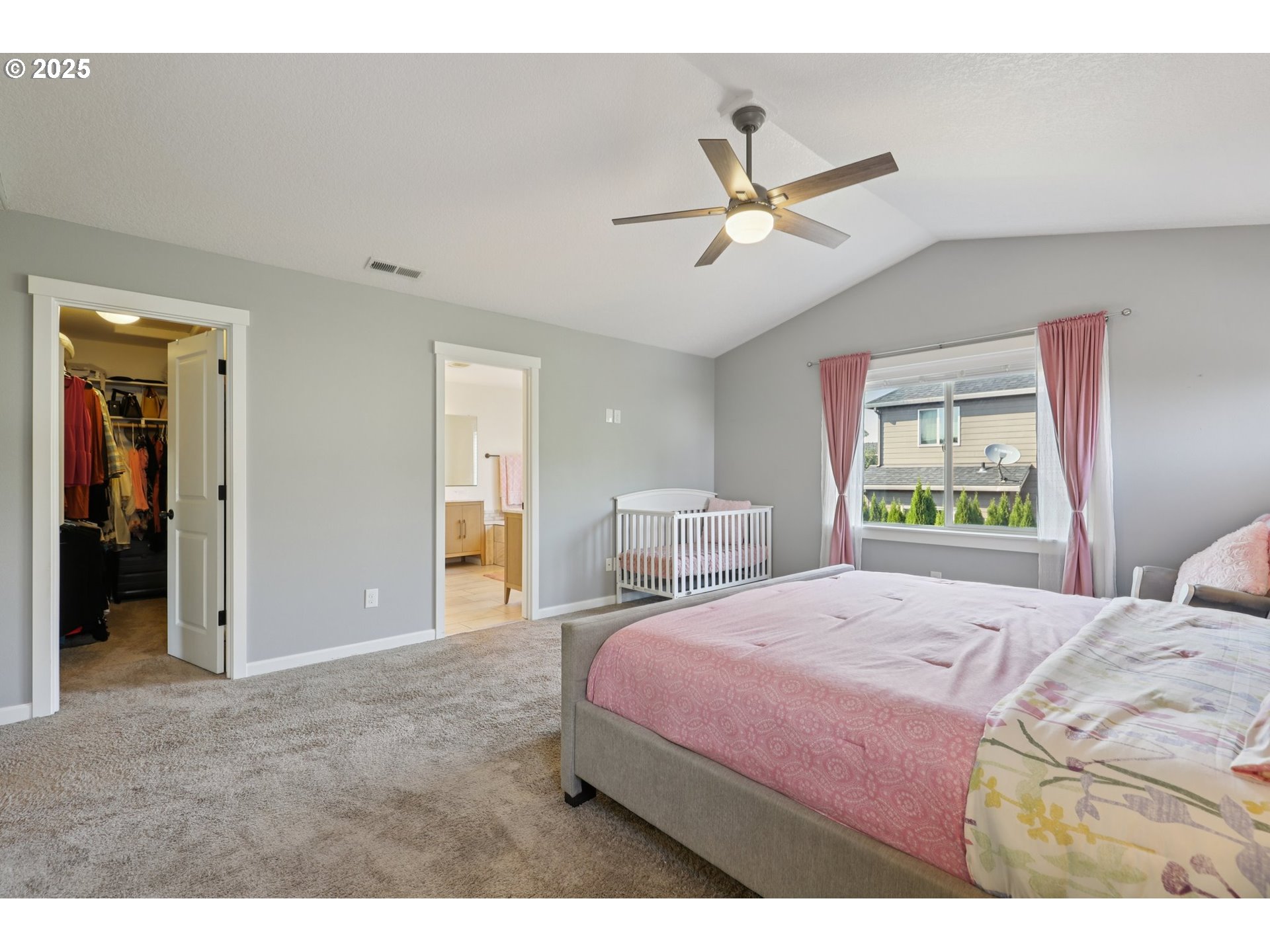 3520 North 6th Circle Ridgefield, WA 98642 - Photo 20 of 27 a bedroom with a bed and a window