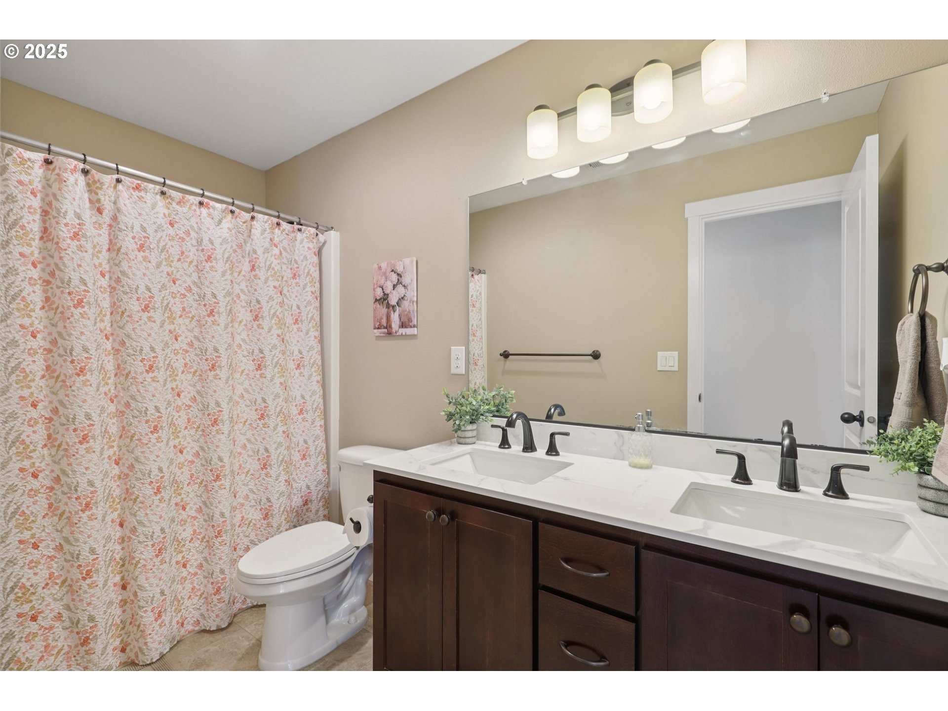 3520 North 6th Circle Ridgefield, WA 98642 - Photo 25 of 27 a bathroom with a double vanity sink mirror and toilet