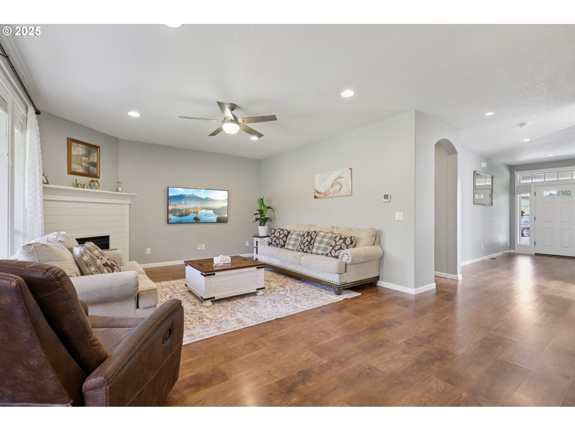 3520 North 6th Circle Ridgefield, WA 98642 - Photo 5 of 27 a living room with furniture and a chandelier