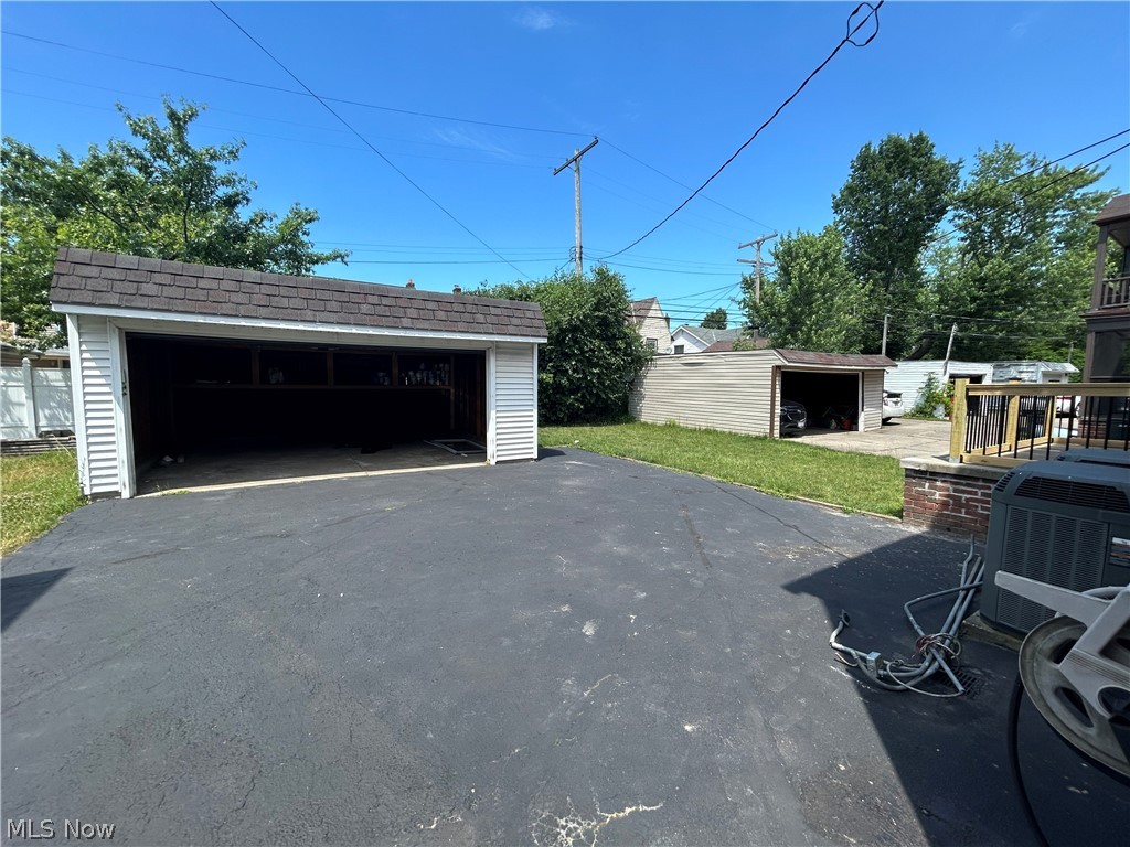 13537 Cedar Road Cleveland, OH 44118 - Photo 27 of 30 Garage with central AC unit