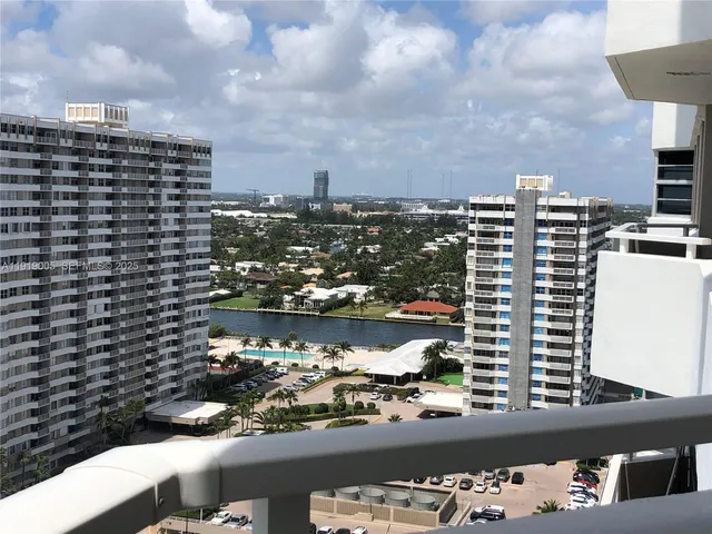 a view of a city with tall buildings