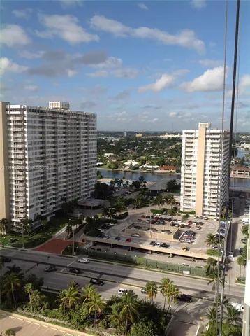 a view of a city with tall buildings