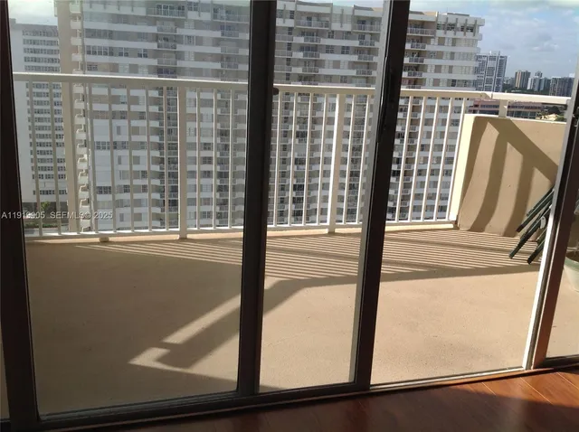 a view of a balcony from a window